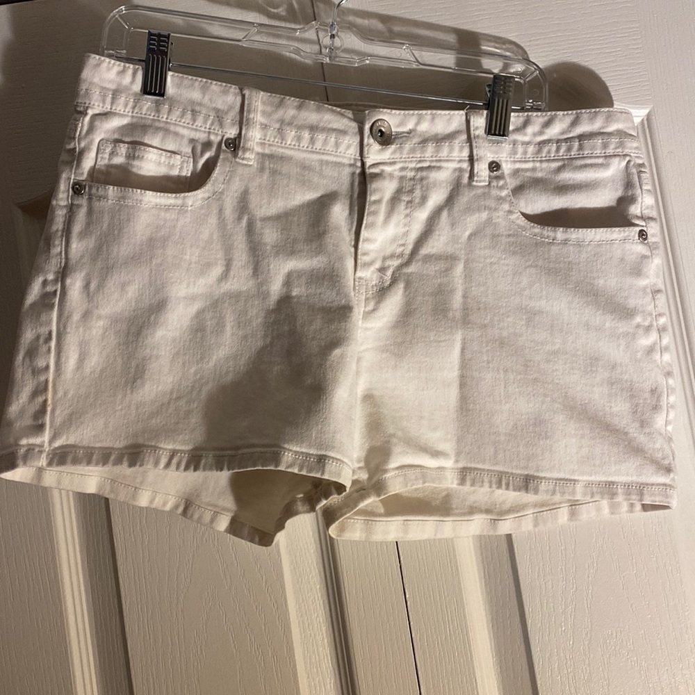 All white jean shorts.